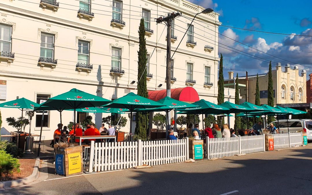 Heineken Brand Advertising with Umbrellas and Barriers